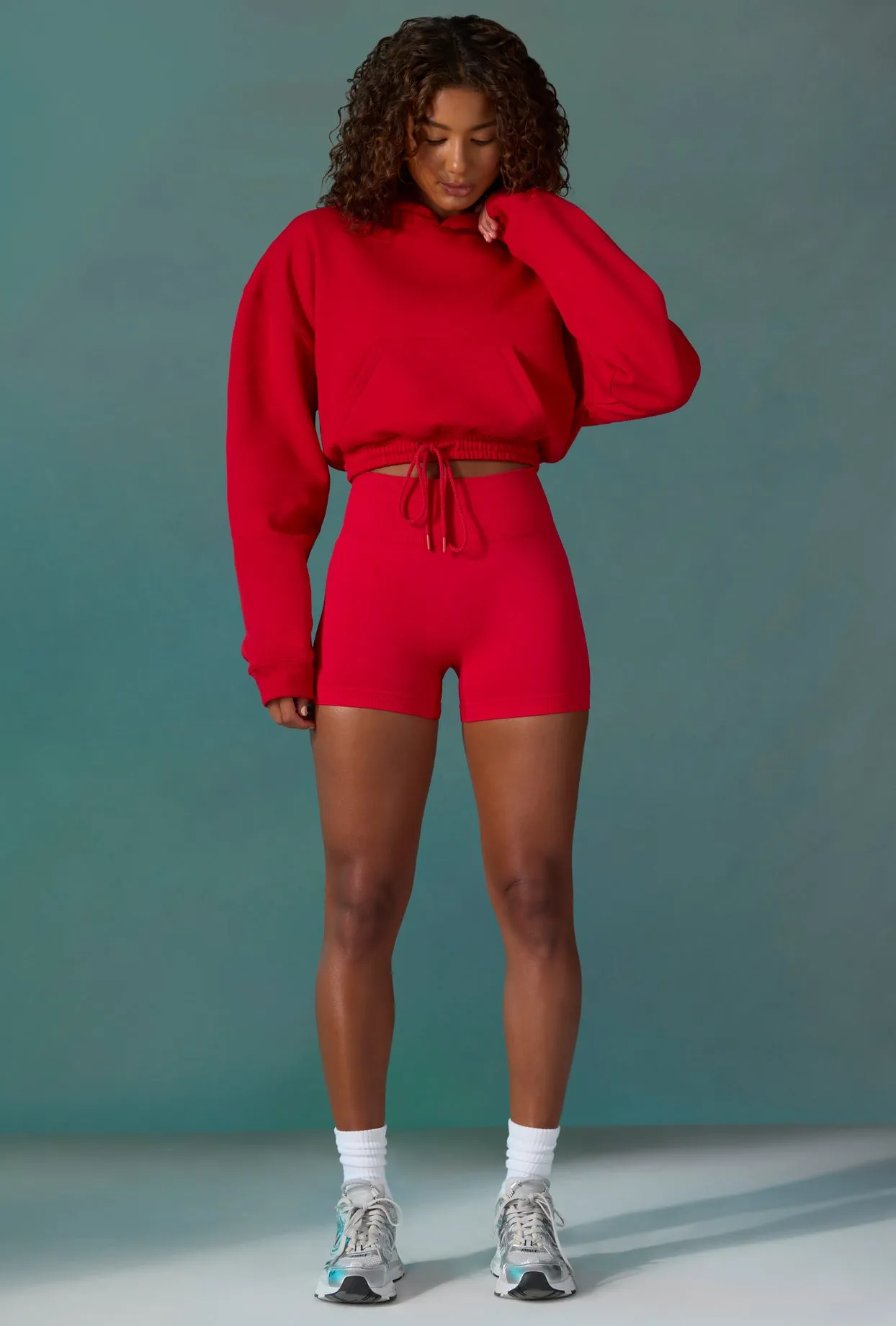 Cropped Drawstring Hooded Sweatshirt in Tango Red